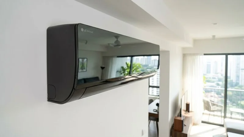 LG Artcool designer aircon unit mounted on a modern Singapore apartment wall